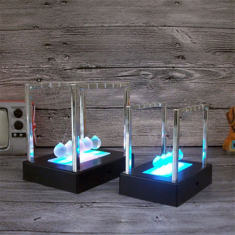Electric LED Newton's Cradle balls