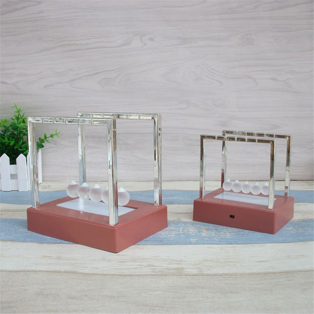 Electric LED Newton's Cradle balls